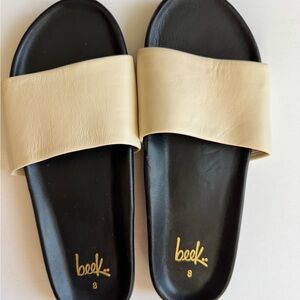 Beek Women's Black and Cream Slide Sandals